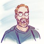 Ein vollbärtiger Mann mit Brille.